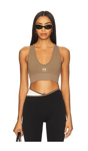 Restore Seamless V Sports Bra in Brown. - size L (also in S, XS) - P.E Nation - Modalova