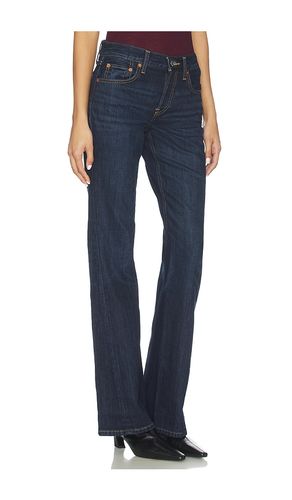 Twisted Mid Rise Bootcut Jeans in . Size 25. Also in 26, 27, 29, 30, 31 - RE/DONE - Modalova