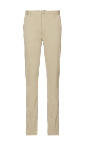 Commuter Slim Pant in Beige. - size 30 (also in 31, 32, 33, 34, 36) - Rhone - Modalova