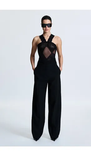 Fiorella Bodysuit in . Size L. Also in M, S, XL, XS, XXS - REVOLVE LOS ANGELES - Modalova