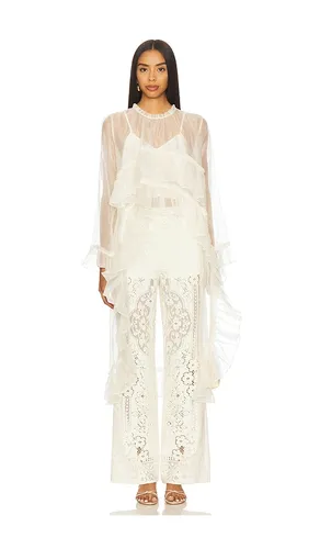 Cornelia Solid High Low Top in . Size L. Also in S - Sea - Modalova