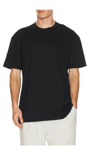 Heavyweight Cotton T-Shirt in Black. - size L (also in M, S, XXL/2X) - SKIMS - Modalova
