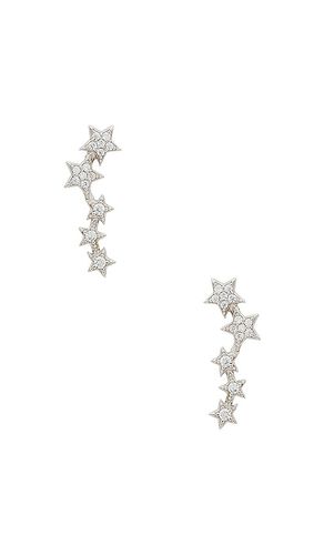 Pendiente de estrella sobre orugas en color metálico talla all en - Metallic Silver. Talla all - SHASHI - Modalova