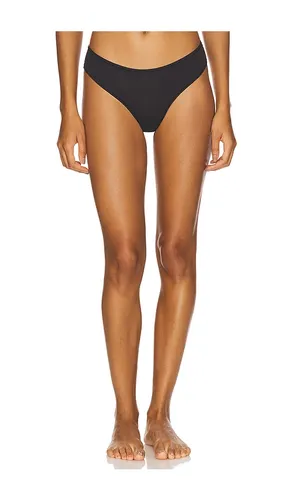 Fits Everybody Thong in Black. - size L (also in XL, XS, XXL, XXS) - SKIMS - Modalova