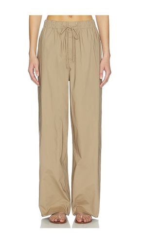 Swiss Cotton Sateen Oversized Drawstring Pant in Tan. - size M (also in S) - SKIMS - Modalova