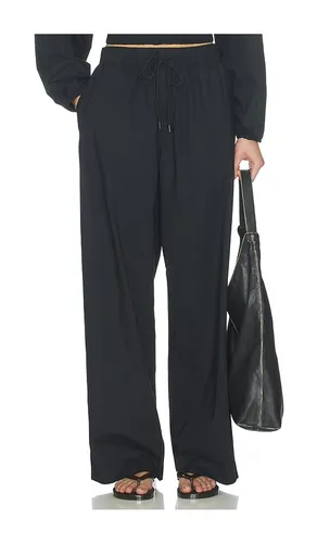Swiss Cotton Sateen Oversized Drawstring Pant in Black. - size S (also in XL) - SKIMS - Modalova