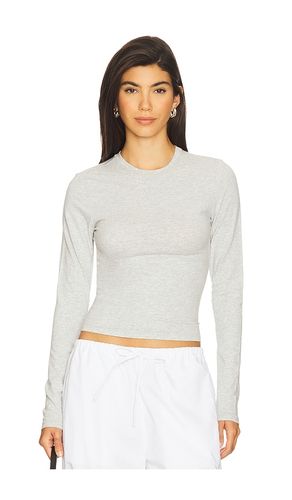 Cotton Jersey Long Sleeve T-Shirt in Light Grey. - size L (also in XL, XXS) - SKIMS - Modalova
