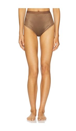 Shape Invisible Thong in Brown. - size L (also in M, S, XL, XS) - SPANX - Modalova