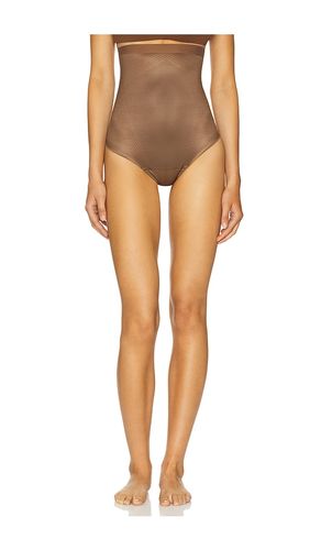Shape Invisible High Waisted Thong in Brown. - size L (also in S, XL, XS) - SPANX - Modalova