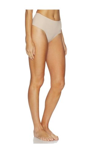 Supersmooth Undie-tectable Thong in Tan. - size L (also in XL, XS, XXL) - SPANX - Modalova