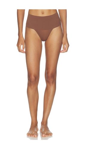 Supersmooth Undie-tectable Thong in Brown. - size L (also in S, XL, XS) - SPANX - Modalova