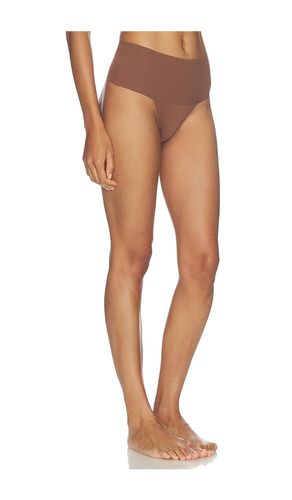 Supersmooth Undie-tectable Thong in Brown. - size L (also in M, S, XL, XS) - SPANX - Modalova