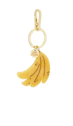 Hand-painted Banana Bag Charm + Keychain in - Solar Eclipse - Modalova