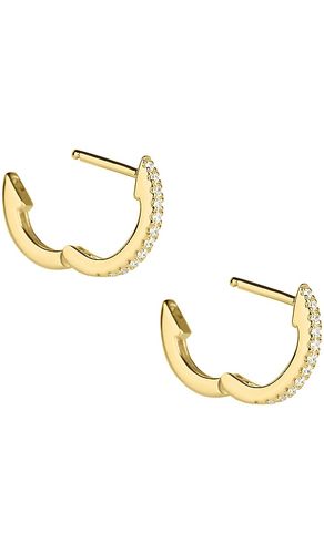 White Diamond Pave Huggie Earrings in - STONE AND STRAND - Modalova