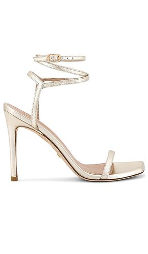 X REVOLVE Barelynudist 100 Sandal in Metallic Gold. - size 10 (also in 6.5, 7, 8, 8.5, 9, 9.5) - Stuart Weitzman - Modalova