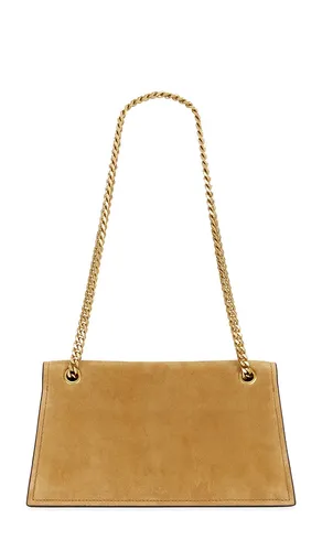 Kira Turnlock Suede Shoulder Bag in - Tory Burch - Modalova