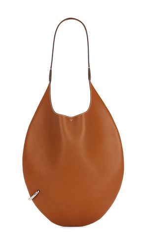 Tory Burch Pierced Soft Bag in Tan - Tory Burch - Modalova
