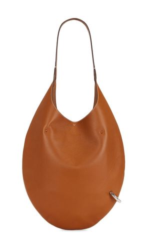 Tory Burch Pierced Soft Bag in Tan - Tory Burch - Modalova