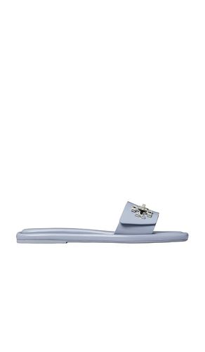 T Lock Slide in Baby Blue. - size 10 (also in 10.5, 11, 5, 5.5, 6, 6.5, 7, 7.5, 8, 8.5, 9, 9.5) - Tory Burch - Modalova
