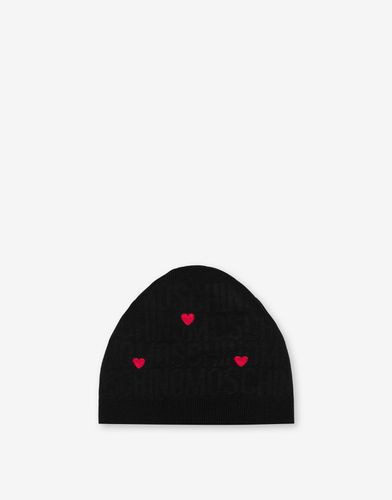 Knitted Hat With Allover Logo Hearts - Moschino - Modalova