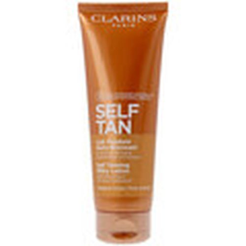 Protección solar Self Tan Autobronceador Leche para mujer - Clarins - Modalova