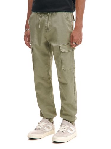 Joggers con bolsillos cargo - Cropp - Modalova