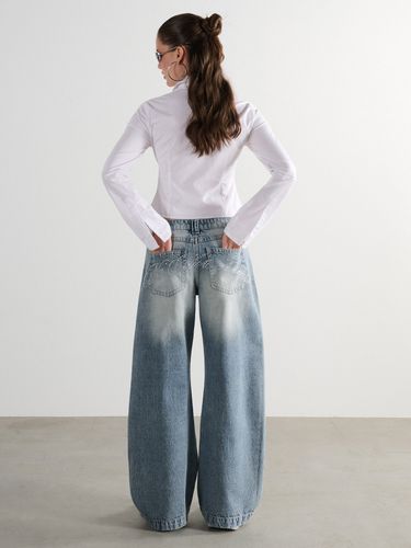 Vaqueros de pernera ancha de efecto lavado - Cropp - Modalova