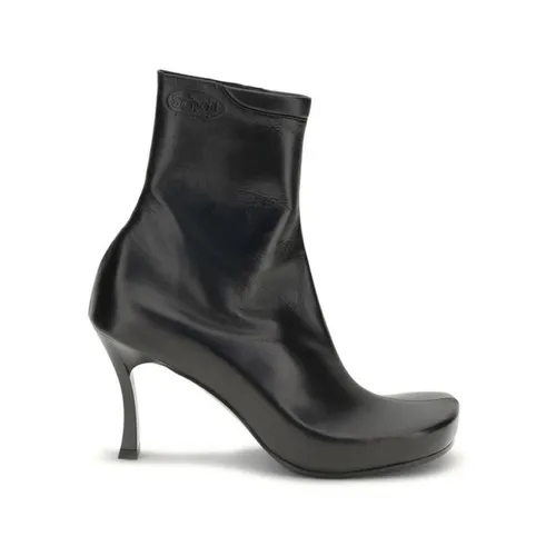 Botines de piel de oveja con logotipos en relieve - Balenciaga - Modalova