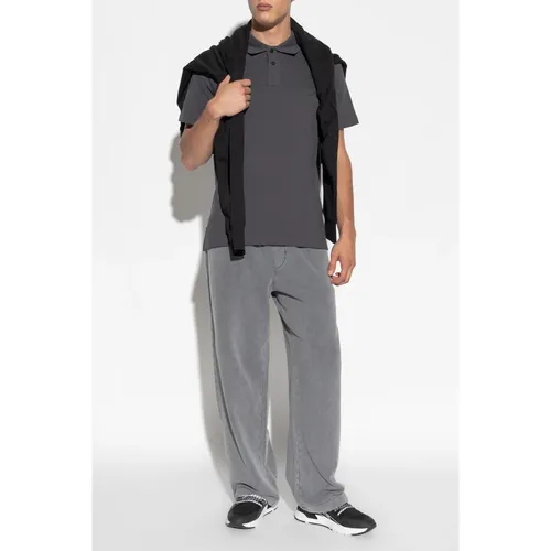 Polo con logo stampato - Versace Jeans Couture - Modalova