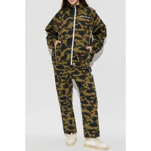 Pantaloni con motivo camouflage - A BATHING APE - Modalova