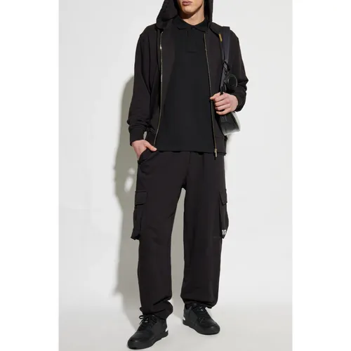 Polo con logo stampato - Versace Jeans Couture - Modalova