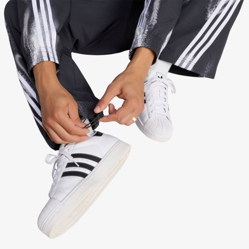 Pantaloni da ginnastica adidas Adilenium 6 Trackpant L - adidas Originals - Modalova