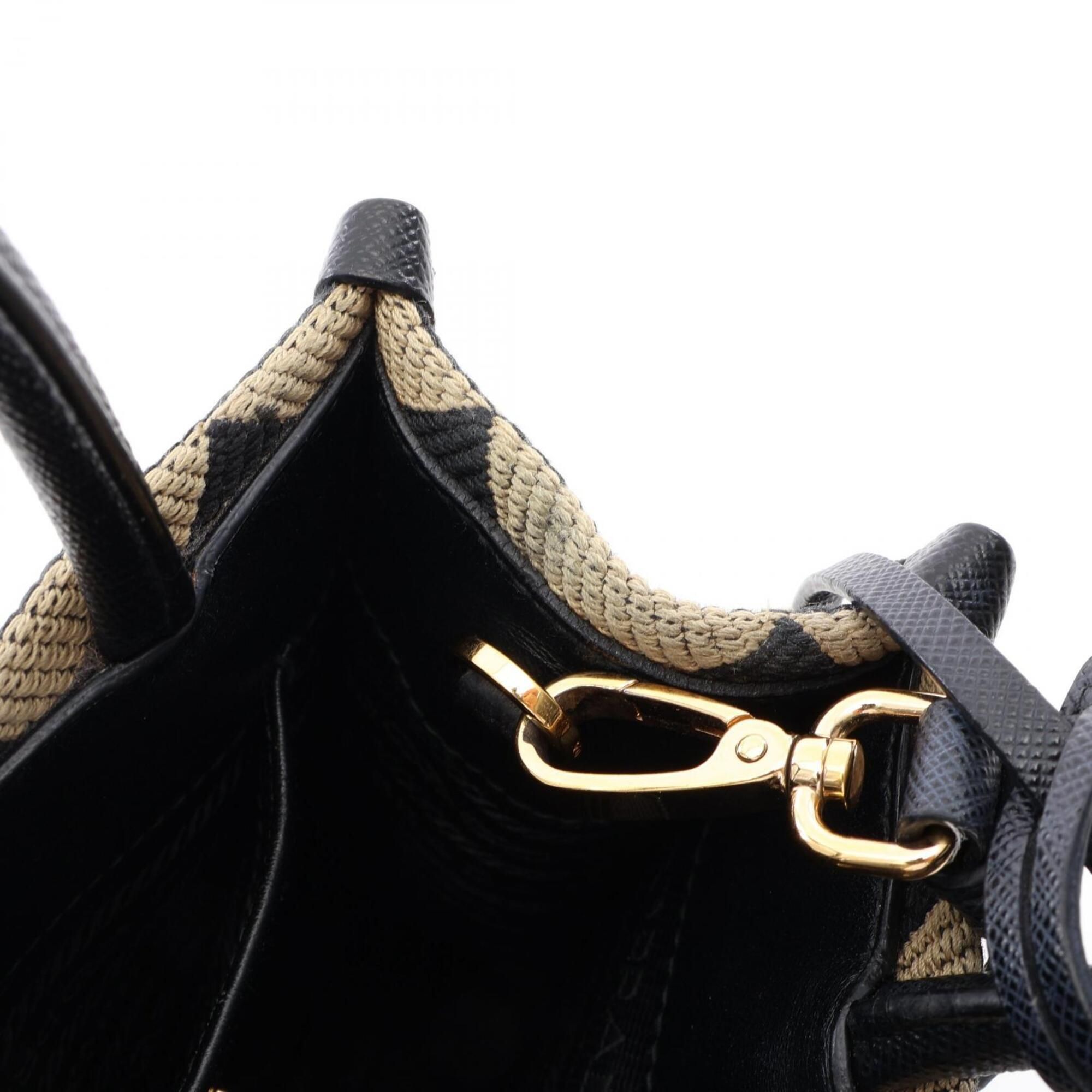 Canvas Saffiano Triangle Handbag (Pre-Owned) - Prada - Modalova