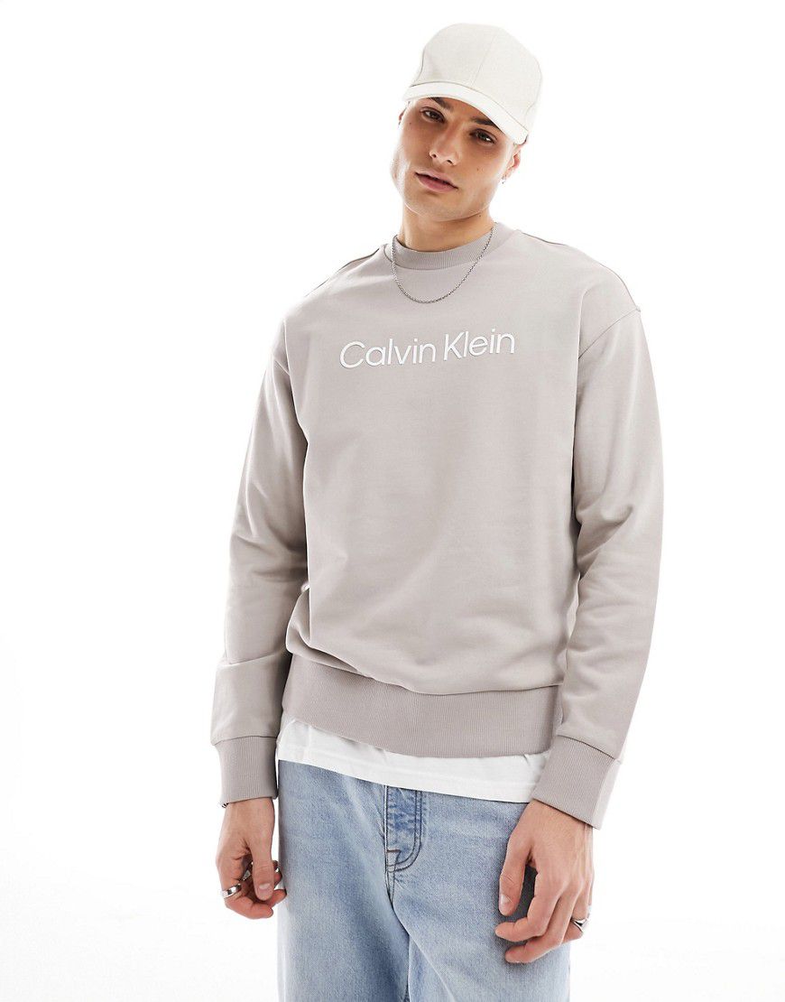 Hero - Felpa confortevole beige con logo - Calvin Klein - Modalova