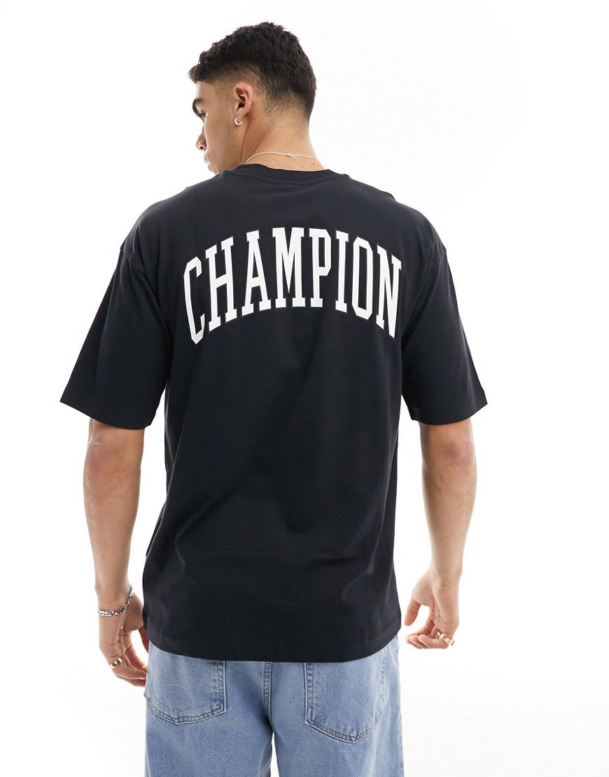 T-shirt nera con stampa del logo sul retro - Champion - Modalova
