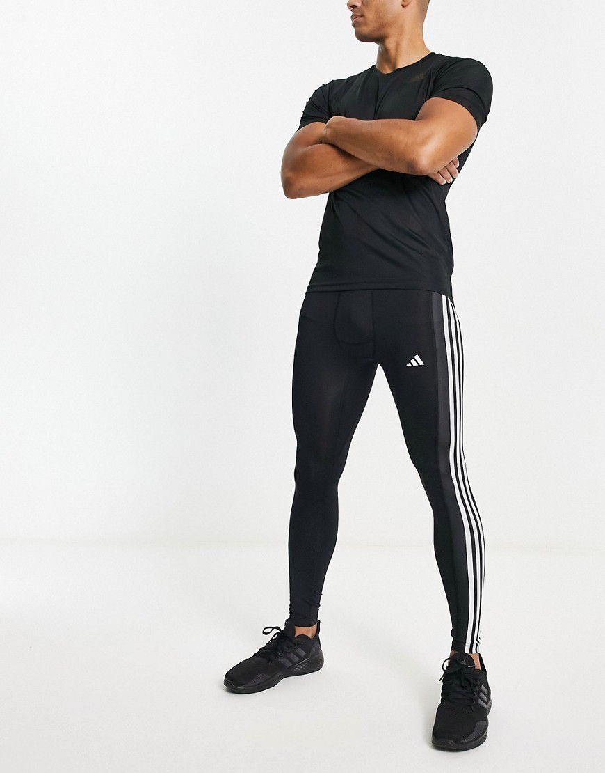 Adidas - Training Techfit - Leggings neri con 3 strisce - adidas performance - Modalova
