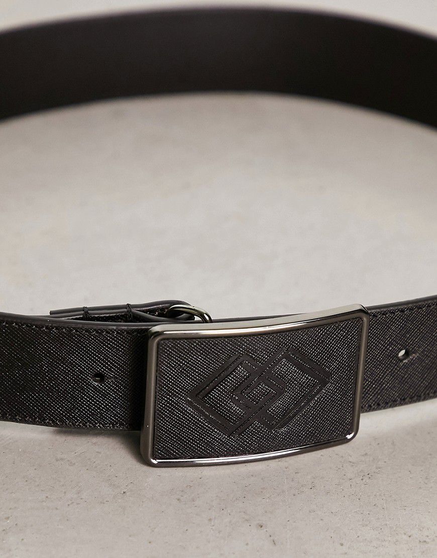 Cintura in pelle nera con fibbia con motivo in rilievo - ASOS DESIGN - Modalova