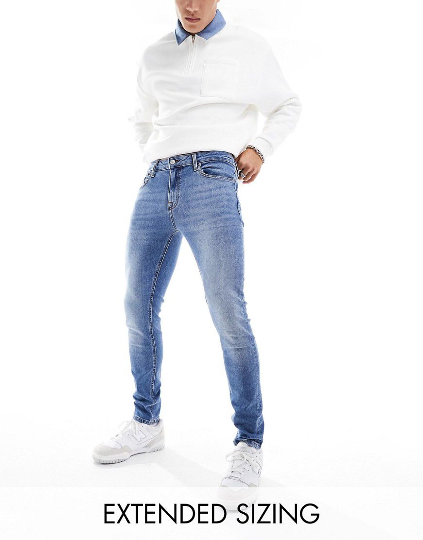 Jeans skinny lavaggio chiaro - ASOS DESIGN - Modalova