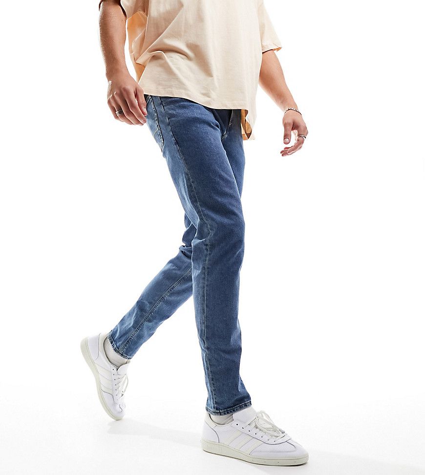 Jeans slim medio slavato - ASOS DESIGN - Modalova