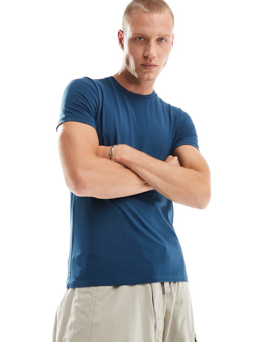 T-shirt attillata blu scuro - ASOS DESIGN - Modalova