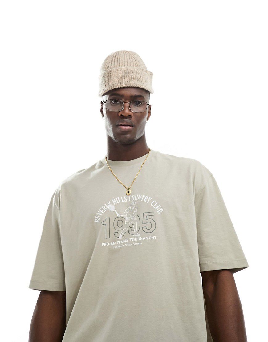 T-shirt oversize beige con stampa stile college sul davanti - ASOS DESIGN - Modalova
