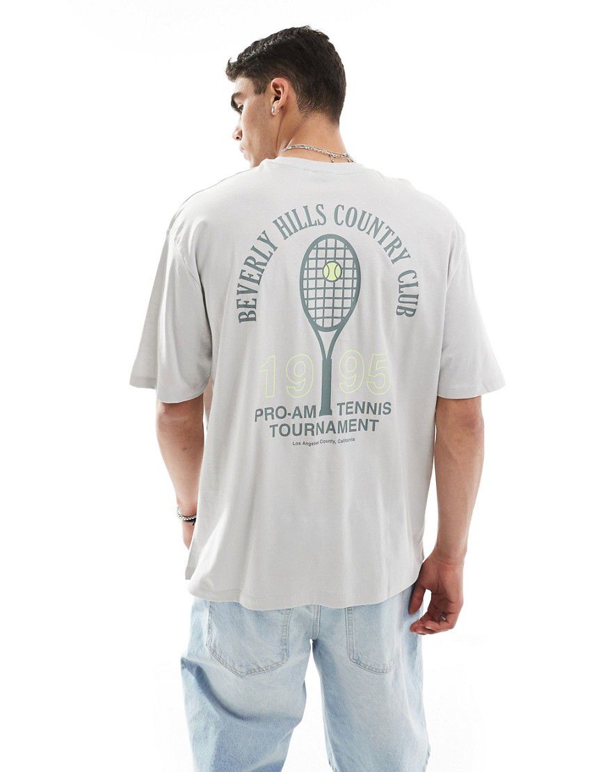 T-shirt oversize grigia con stampa tennis sulla schiena - ASOS DESIGN - Modalova