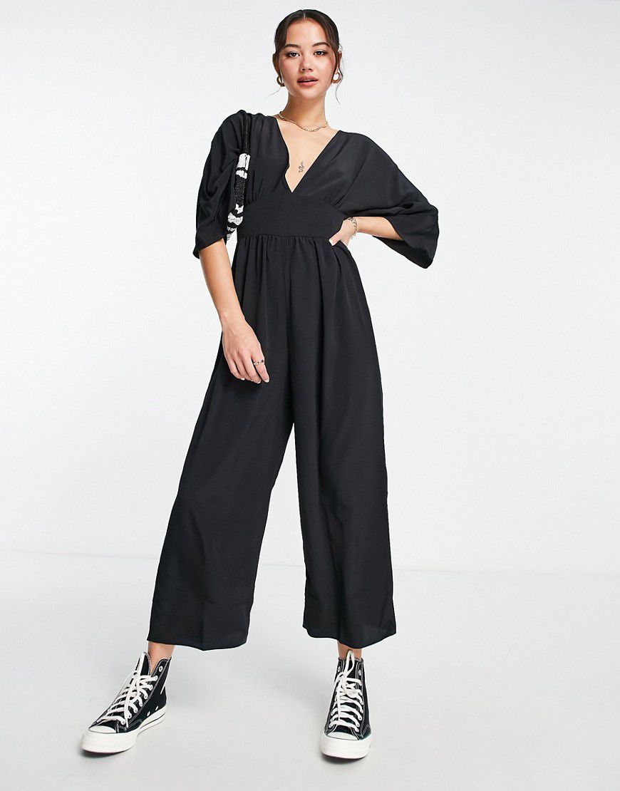 Tuta jumpsuit nera con pantaloni culotte e maniche a kimono - ASOS DESIGN - Modalova