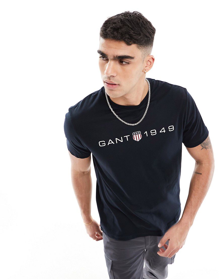 T-shirt nera con stampa del logo e stemma - Gant - Modalova