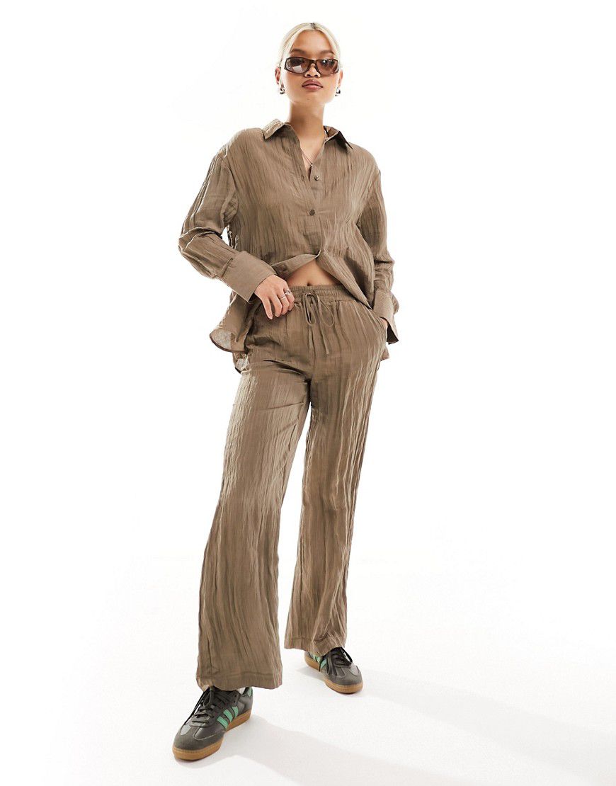 Pantaloni a fondo ampio testurizzati chiaro in coordinato - ONLY - Modalova