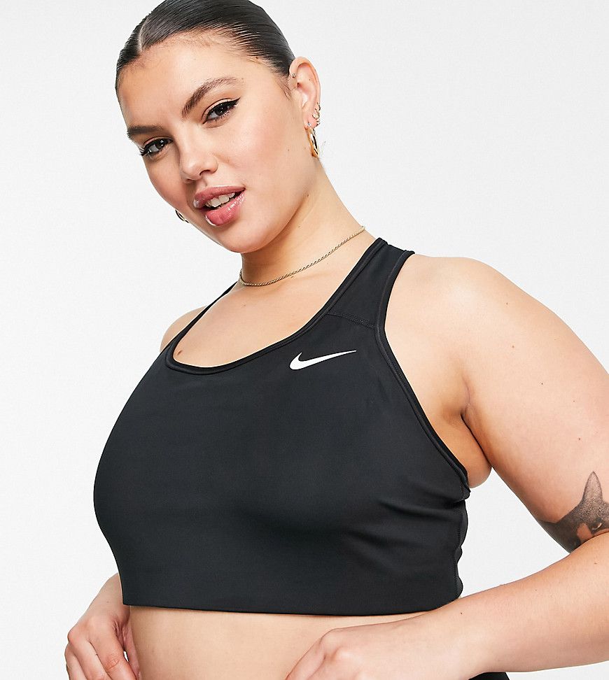 Plus - Reggiseno non imbottito con logo Nike - Nike Training - Modalova