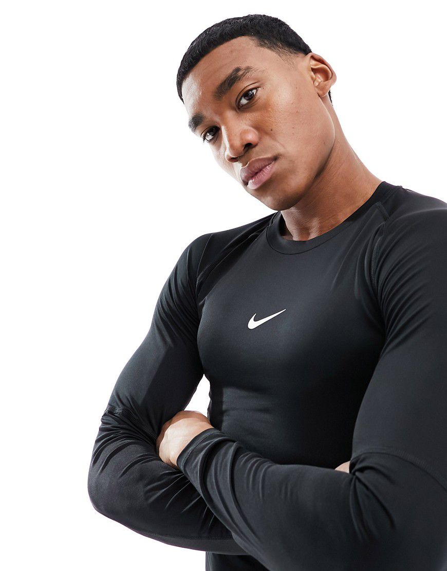 Nike Pro Training - Dri-FIT - Maglietta nera a maniche lunghe con logo - Nike Training - Modalova