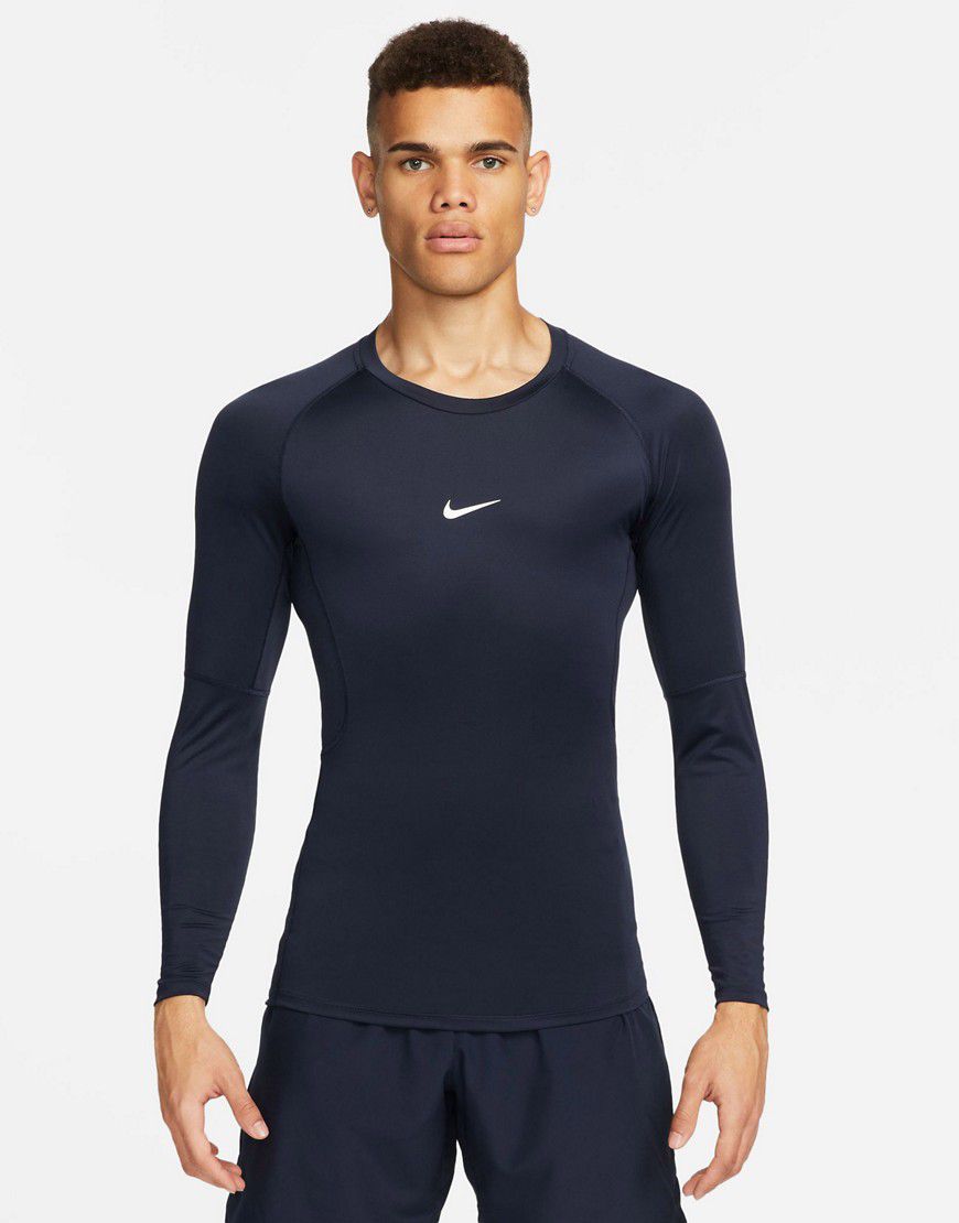 Nike - Pro Training - Top a maniche lunghe attillato blu navy - Nike Training - Modalova