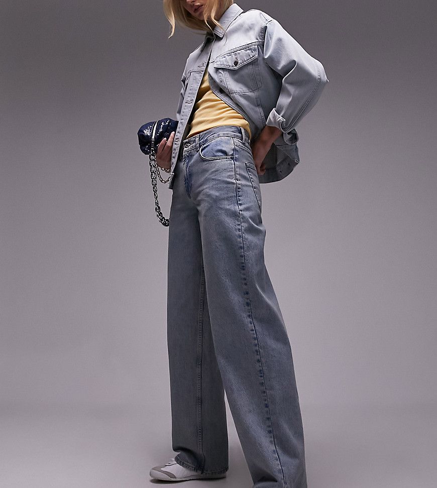 Jeans con cinturino sul retro effetto candeggiato sporco - Topshop Tall - Modalova
