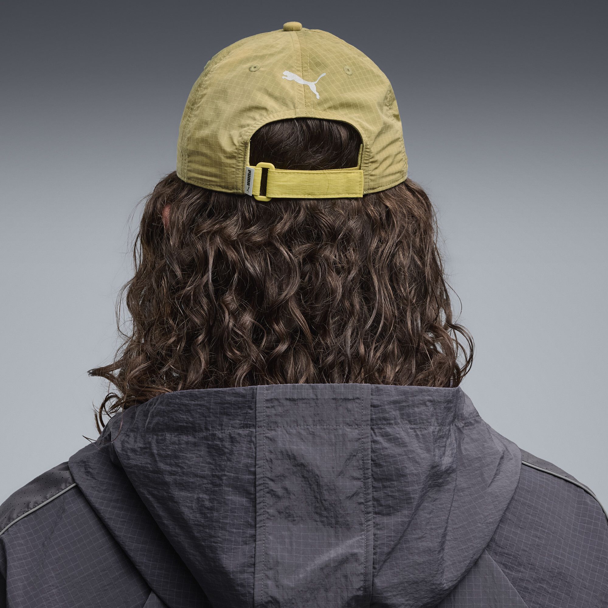RUN Culture Collective Short Visor Cap in Brown - PUMA - Modalova